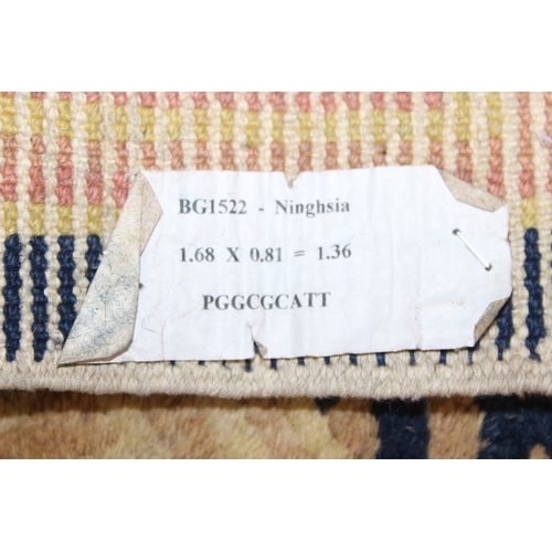202 - Two antique style Ningxia (Ninghsia) Key-Fret designed rugs, the largest 193cm x 83cm [2]