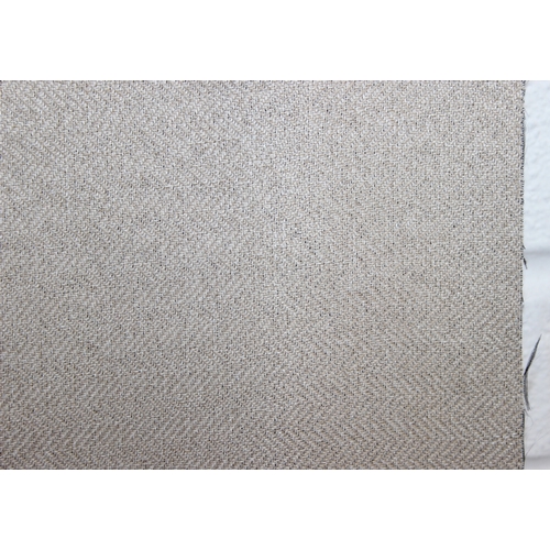 207 - A large roll of fabric, a light grey herringbone tweed style pattern, 3m long, many meters on roll