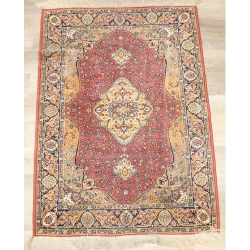 208 - A vintage Heriz style rug of red ground, 150cm x 100cm