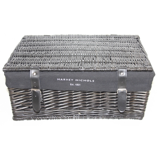 280 - Two black Harvey Nichols hamper baskets with buckled straps and canvas lining, 44cm x 32cm x 20cm [2... 