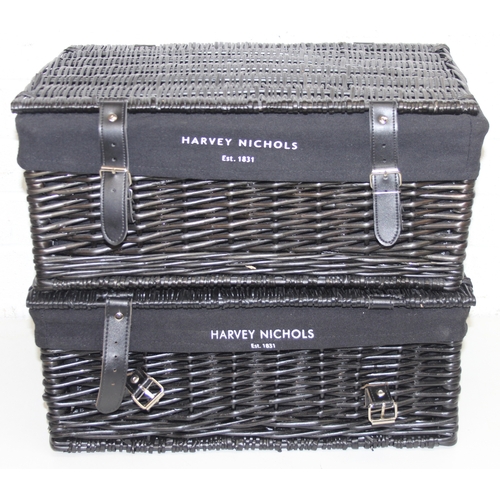 280 - Two black Harvey Nichols hamper baskets with buckled straps and canvas lining, 44cm x 32cm x 20cm [2... 