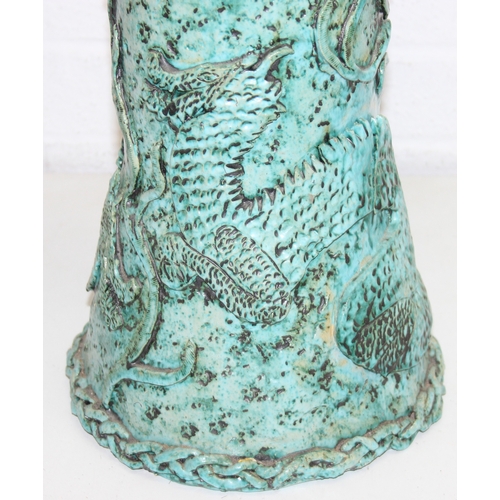 281 - An unusual studio pottery jardinière stand, decorated with dragon and flowers with turquoise glaze, ... 