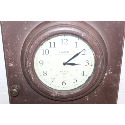 283 - A modern industrial style painted metal wall cabinet with inset clock, the dial marked for J. Pascal... 