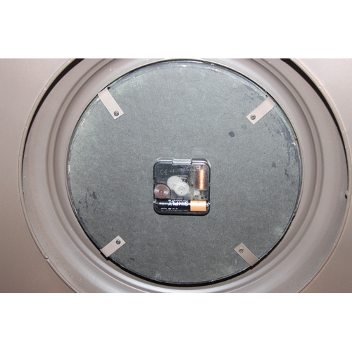 283 - A modern industrial style painted metal wall cabinet with inset clock, the dial marked for J. Pascal... 