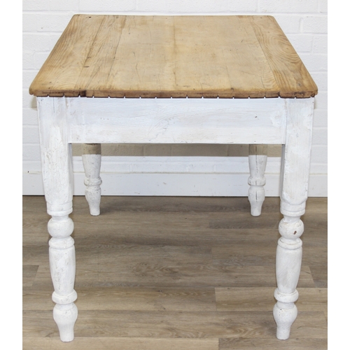 51 - An antique pine farmhouse table with distressed white painted base and turned legs, 106cm x 72cm x 7... 