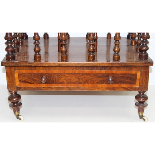 30 - A 19th century walnut Canterbury or magazine rack with single drawer, turned supports and brass and ... 