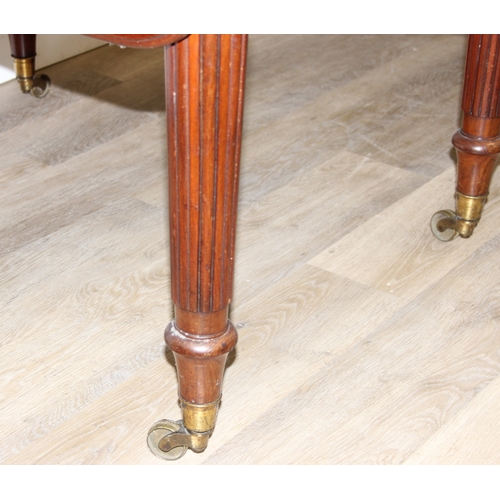 80 - Holland & Sons of London - a mid-late 19th century dropleaf table with single drawer, the drawer sta... 