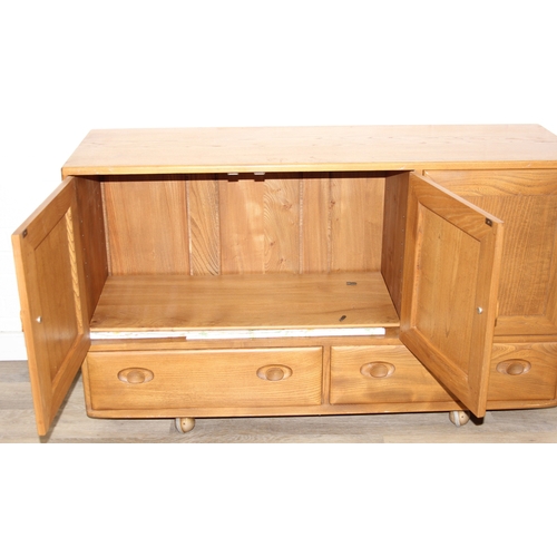 1 - A retro Ercol Windsor model 468 sideboard, three cupboards over two drawers, blonde finish, 128cm x ... 