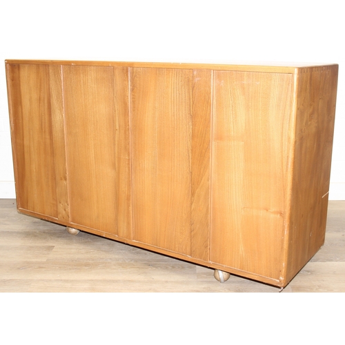 1 - A retro Ercol Windsor model 468 sideboard, three cupboards over two drawers, blonde finish, 128cm x ... 