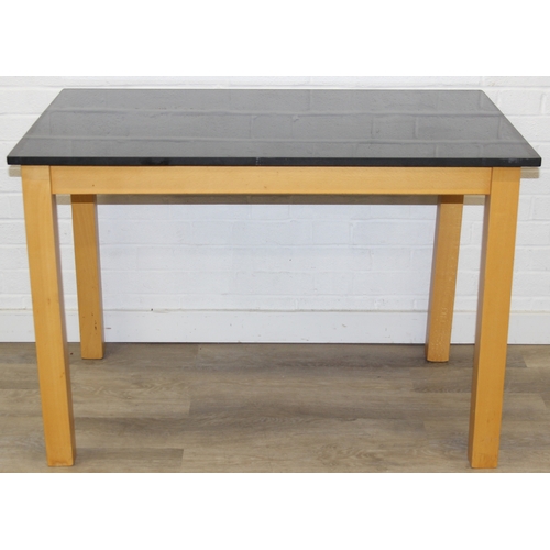 13 - A modern dining table with black slate top and two chairs, light oak finish, 110cm x 70cm x 75cm