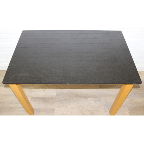 13 - A modern dining table with black slate top and two chairs, light oak finish, 110cm x 70cm x 75cm