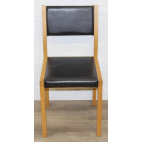 13 - A modern dining table with black slate top and two chairs, light oak finish, 110cm x 70cm x 75cm