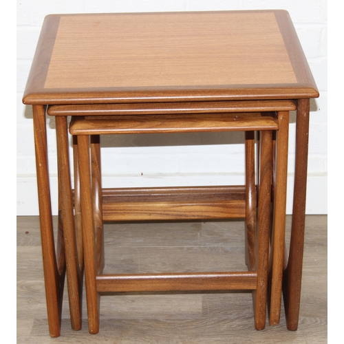14 - G-Plan Astro - a retro nest of three tables, label verso, the largest table 50cm x 50cm x 51cm