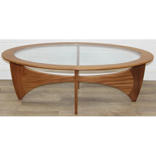 26 - A retro G-Plan oval topped coffee table with glass inset top, 123cm x 66cm x 42cm