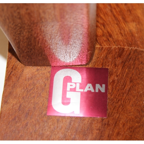 26 - A retro G-Plan oval topped coffee table with glass inset top, 123cm x 66cm x 42cm