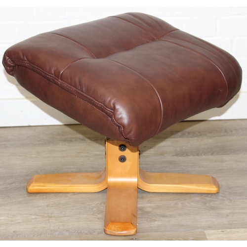 11 - An Ekornes style brown leather reclining armchair with matching footstool, splayed base, 76cm wide x... 