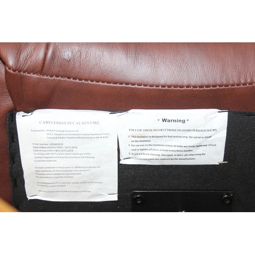 11 - An Ekornes style brown leather reclining armchair with matching footstool, splayed base, 76cm wide x... 