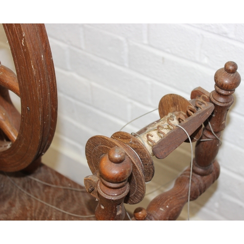 53 - James Williamson (believed to be for Timbertops Thurmaston), a vintage oak or elm spinning wheel, st... 