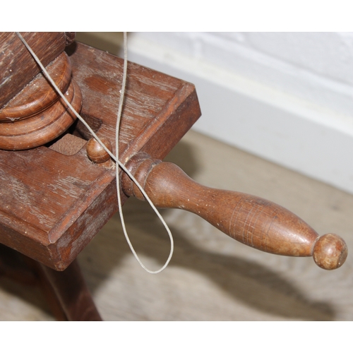 53 - James Williamson (believed to be for Timbertops Thurmaston), a vintage oak or elm spinning wheel, st... 