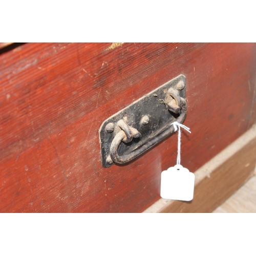 87 - A vintage stained pine trunk or tool box with iron handles, 90cm x 44cm x 43cm