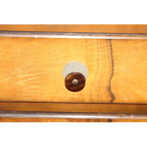 110 - An Art Deco period walnut effect three drawer chest of drawers, 87cm x 44cm x 76cm