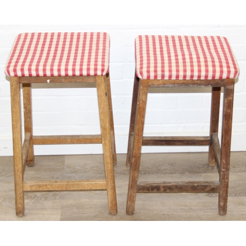 114A - Two vintage light oak stools with red gingham upholstery, each 63cm tall