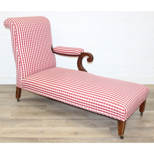114 - An antique mahogany chaises longue with exposed frame and red gingham upholstery, 130cm x 60cm x 90c... 