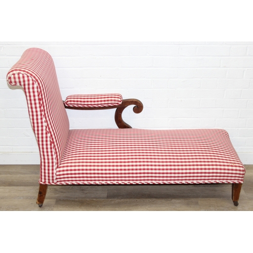 114 - An antique mahogany chaises longue with exposed frame and red gingham upholstery, 130cm x 60cm x 90c... 