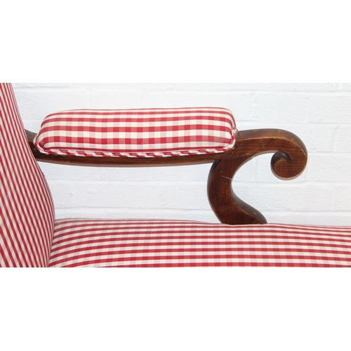 114 - An antique mahogany chaises longue with exposed frame and red gingham upholstery, 130cm x 60cm x 90c... 