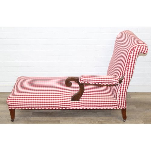 114 - An antique mahogany chaises longue with exposed frame and red gingham upholstery, 130cm x 60cm x 90c... 