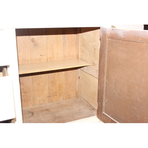 58 - A vintage painted pine sideboard with three drawers and single cupboard, ceramic handles, 120cm x 48... 