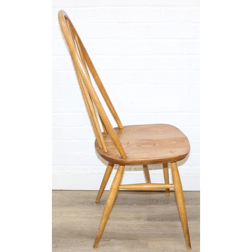 24 - A set of four Ercol Quaker high hoop back dining chairs, blonde finish, gold label, each 96cm tall