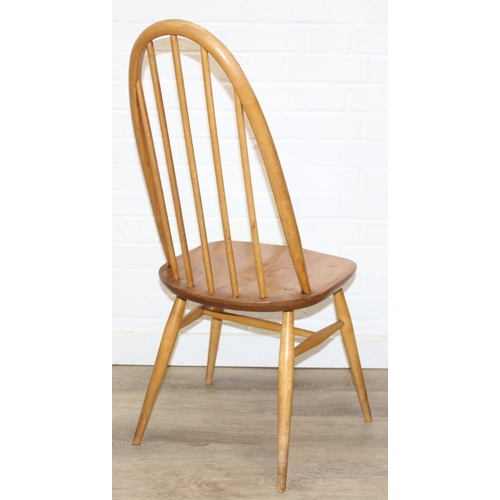 24 - A set of four Ercol Quaker high hoop back dining chairs, blonde finish, gold label, each 96cm tall