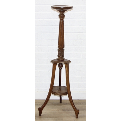 192 - An unusual vintage mahogany 3-legged jardinière stand with carved details, 115cm