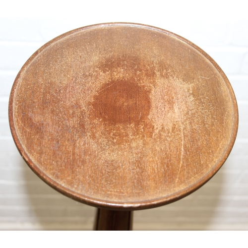 192 - An unusual vintage mahogany 3-legged jardinière stand with carved details, 115cm