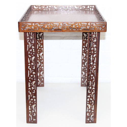 193 - A vintage Chinese Chippendale style mahogany side table with pierced gallery and supports, 20th cent... 