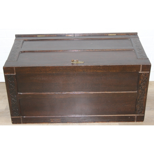112 - An unusual dark oak trunk of ottoman box, Gothic style with linen press drawers to interior, 102cm x... 