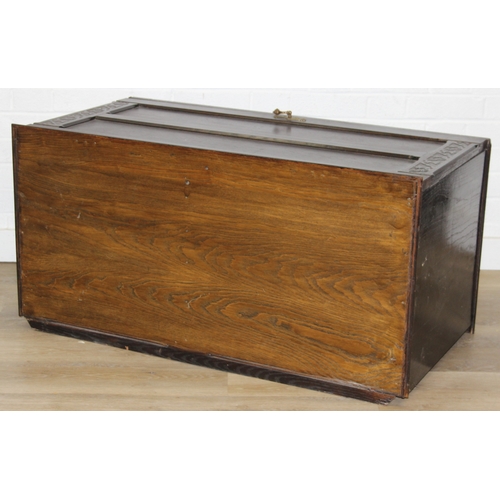 112 - An unusual dark oak trunk of ottoman box, Gothic style with linen press drawers to interior, 102cm x... 