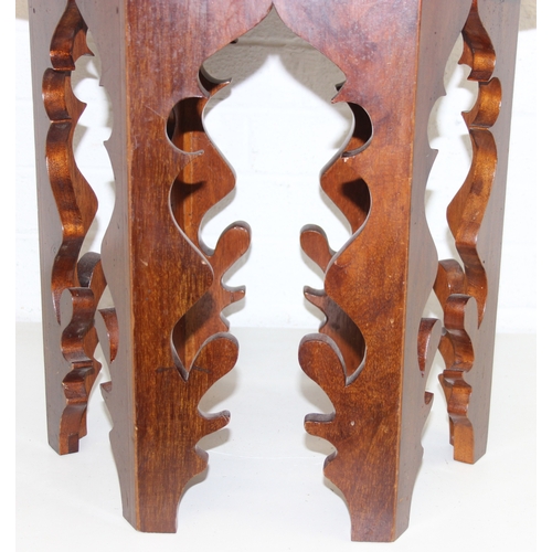 182 - A small vintage brass topped table with Moorish style carved wooden base, 60cm in diameter x 50cm ta... 