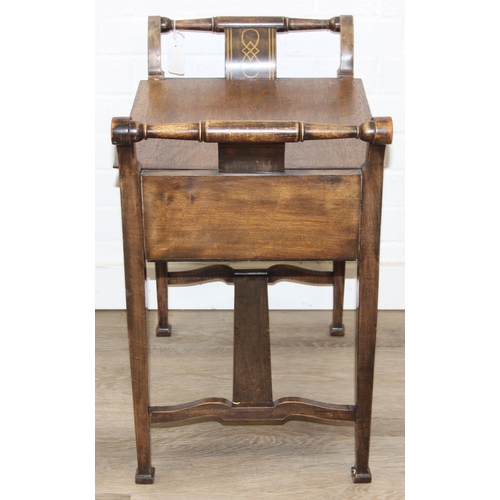 199A - An antique piano stool with lift up lid and boxwood inlay, later top and a Victorian low chair with ... 