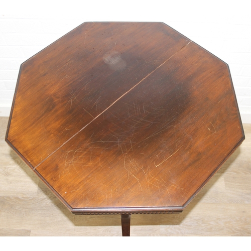 101 - An Edwardian octagonal topped mahogany table, stamped for Joslins of Colchester under, and a further... 