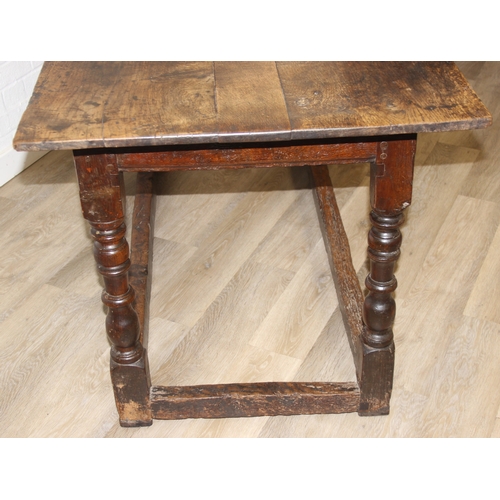 5 - A 17th century and later oak refectory table with turned legs and stretchers, the base likely 17th c... 