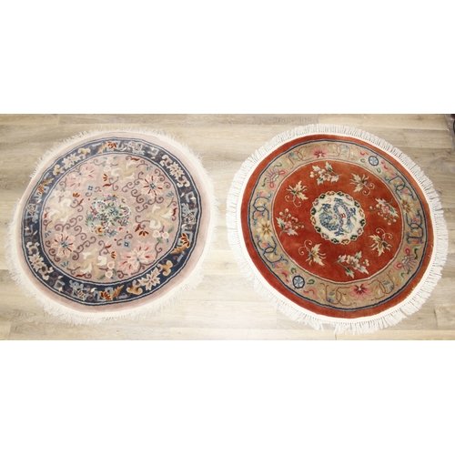 211 - Two circular Chinese wool rugs, one salmon ground, the other russet, each 140cm in diameter [2]