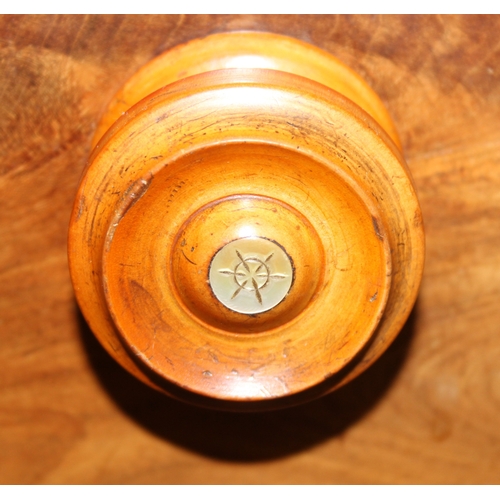 181 - A Victorian flame mahogany bow fronted two over three chest of drawers with bun handles and turned f... 