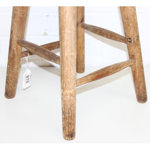 56 - Two rustic pine low stools, each 46cm tall