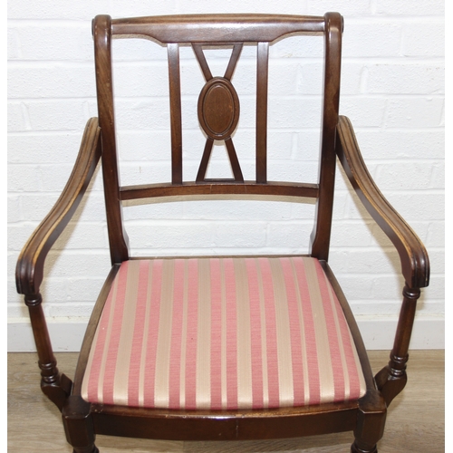 89 - A Georgian style mahogany dining table with brass paw feet and a set of six matching dining chairs, ... 