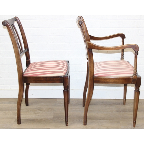 89 - A Georgian style mahogany dining table with brass paw feet and a set of six matching dining chairs, ... 