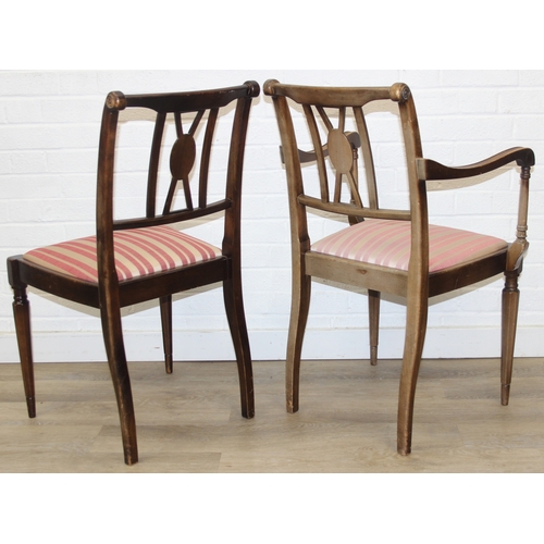 89 - A Georgian style mahogany dining table with brass paw feet and a set of six matching dining chairs, ... 