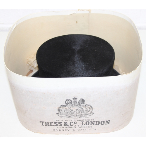 216 - Vintage black silk top hat by Brown Muff & Co Ltd of Bradford in original box, hat aperture 20cm x 1... 
