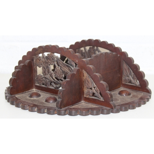 285 - An antique wall-mountable wooden shelf with central convex mirror and carved floral decoration, like... 